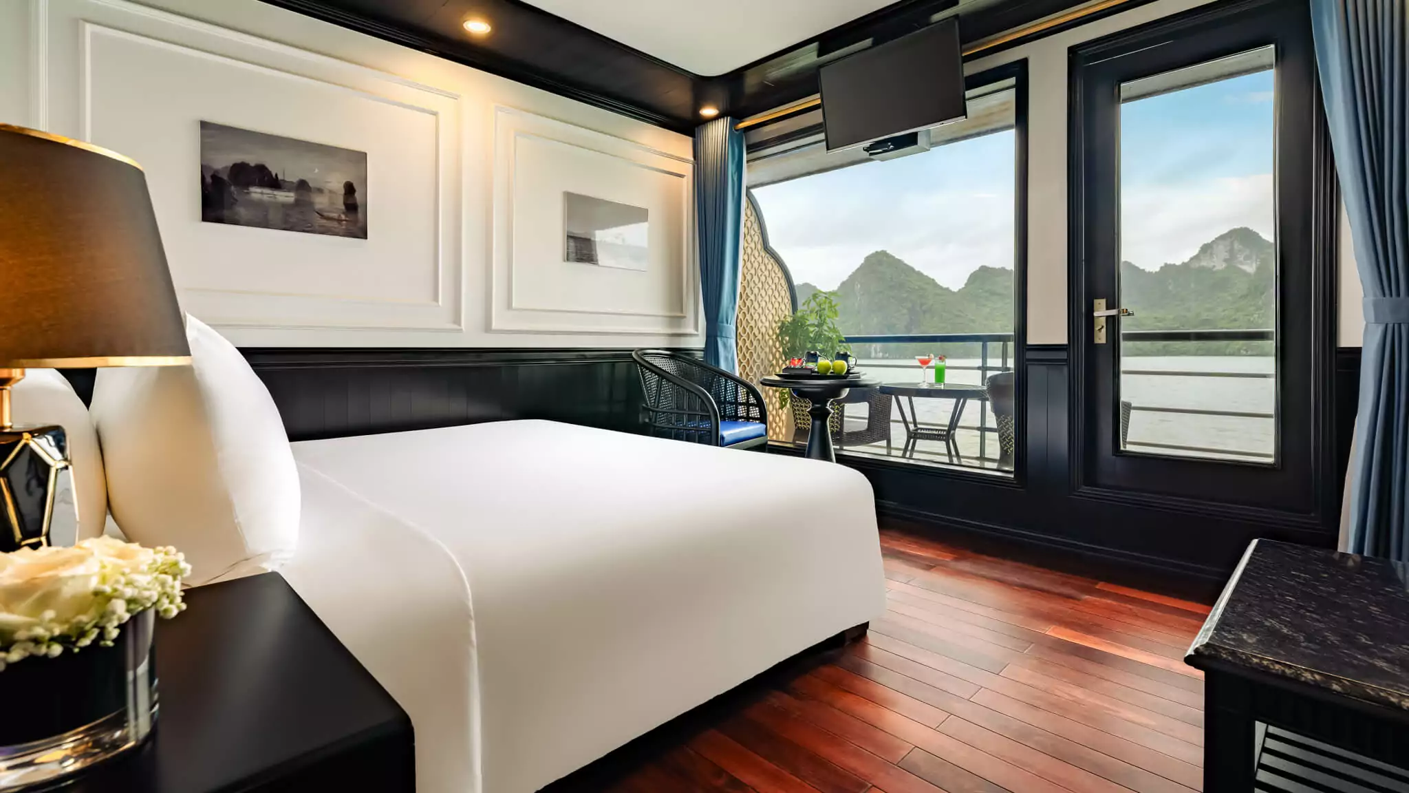 Junior Suite bedroom with private balcony on La Casta Cruise