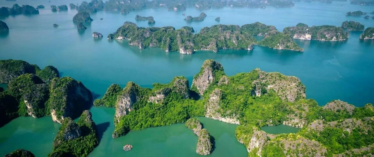 Aerial view of Bai Tu Long Bay attractions — pristine limestone islands and uncrowded waters, UNESCO World Heritage Site, Vietnam