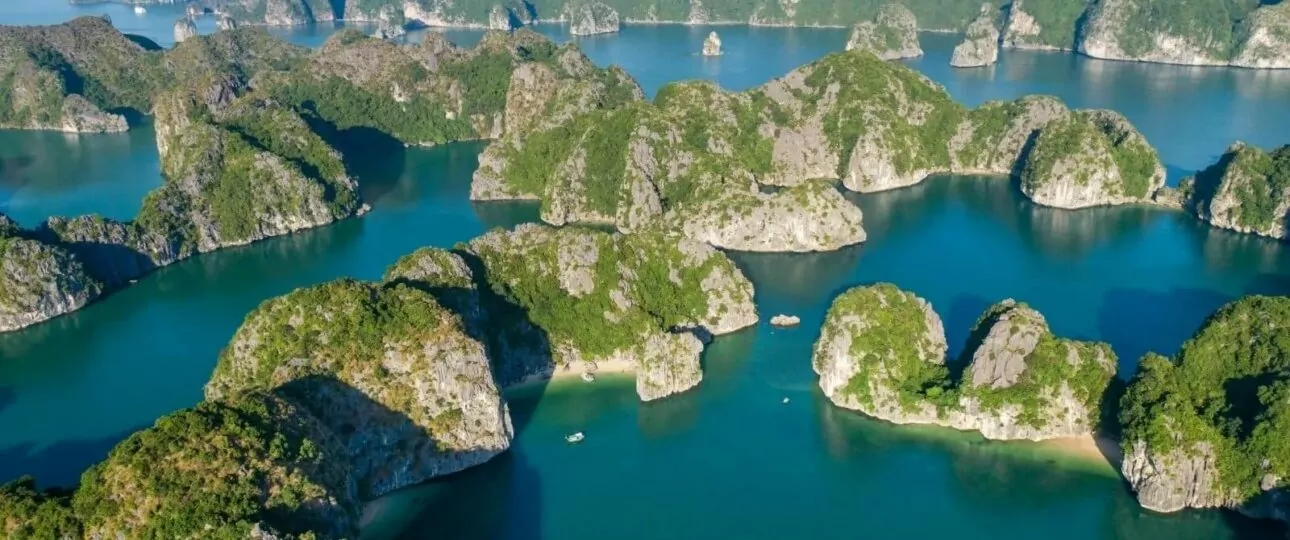 Aerial view of Lan Ha Bay attractions — limestone karst islands and Cat Ba Island, UNESCO World Heritage Site, Vietnam