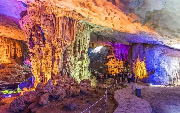 Thien Cung Cave entrance hall — first chamber with high ceiling and chandelier-like stalactites, Halong Bay Vietnam