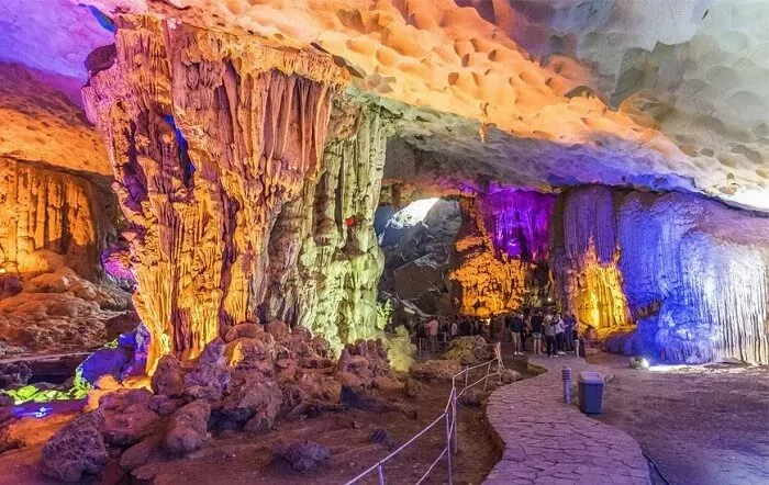 Thien Cung Cave entrance hall — first chamber with high ceiling and chandelier-like stalactites, Halong Bay Vietnam