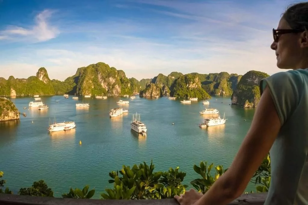 360-degree panoramic view of Halong Bay from Ti Top Island summit at 110 meters — thousands of limestone karsts rising from emerald water, Vietnam