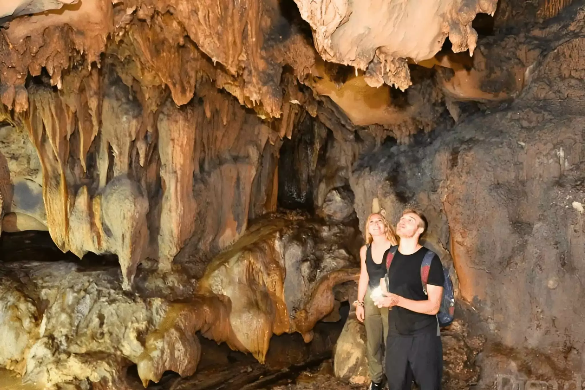 Trung Trang Cave interior — natural limestone stalactites and stalagmites inside Cat Ba National Park, Lan Ha Bay Vietnam