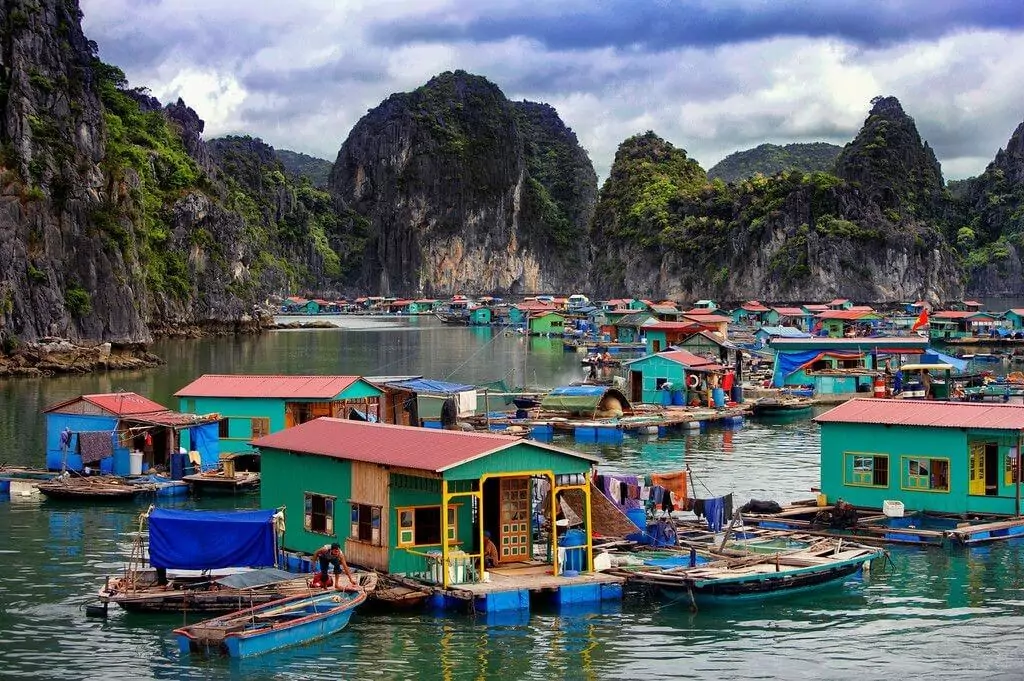Vung Vieng Fishing Village — traditional floating wooden homes, one of the last floating communities in Vietnam, Bai Tu Long Bay