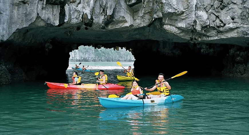 Kayaking through Luon Cave on the Dolphin Halong Bay Day Cruise itinerary