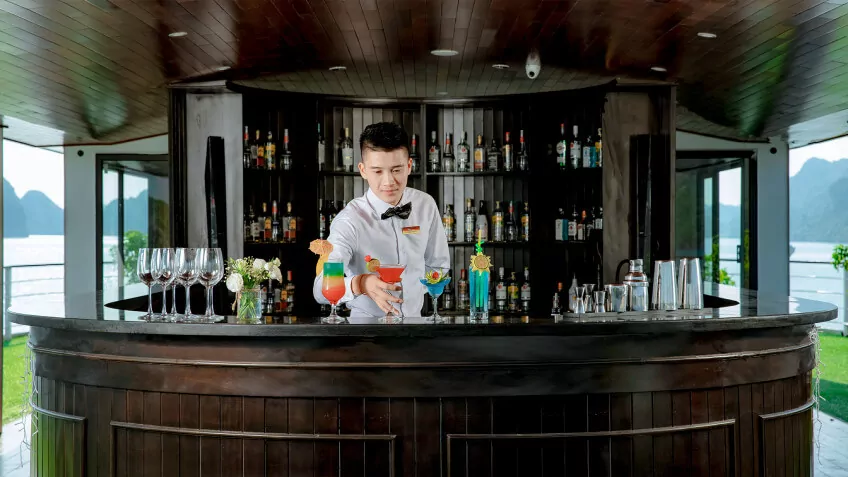 Mon Cheri Cruises Halong Bay open-air Sky Bar with panoramic karst views