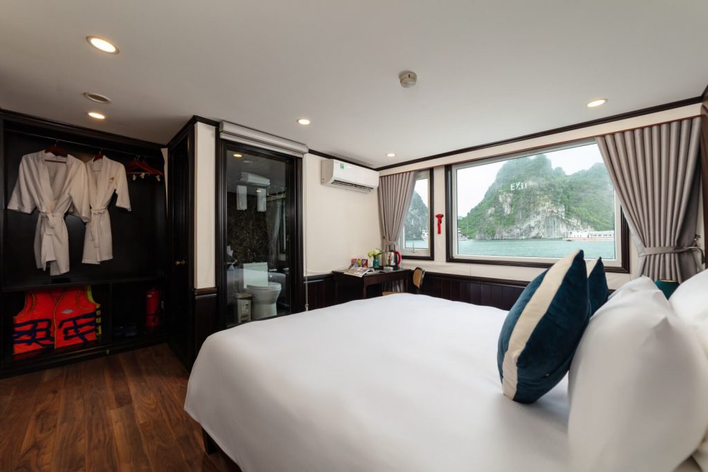 Amanda Cruise Halong Bay Deluxe Cabin bedroom with bay view window