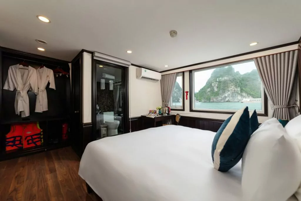 Amanda Cruise Halong Bay Deluxe Cabin bedroom with bay view window