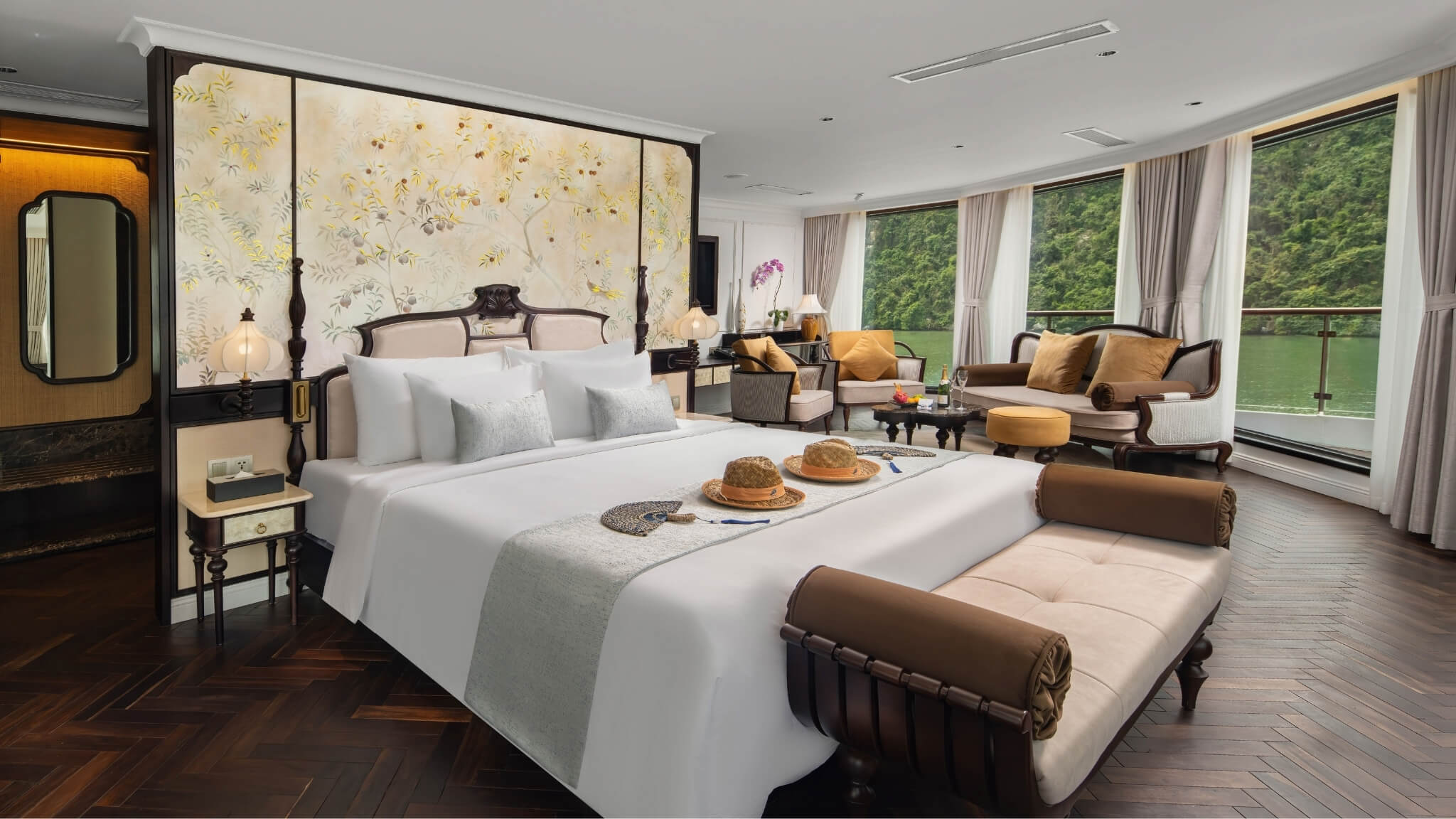 Lyra Grandeur Cruise Owner Suite with four-poster bed and private lounge area