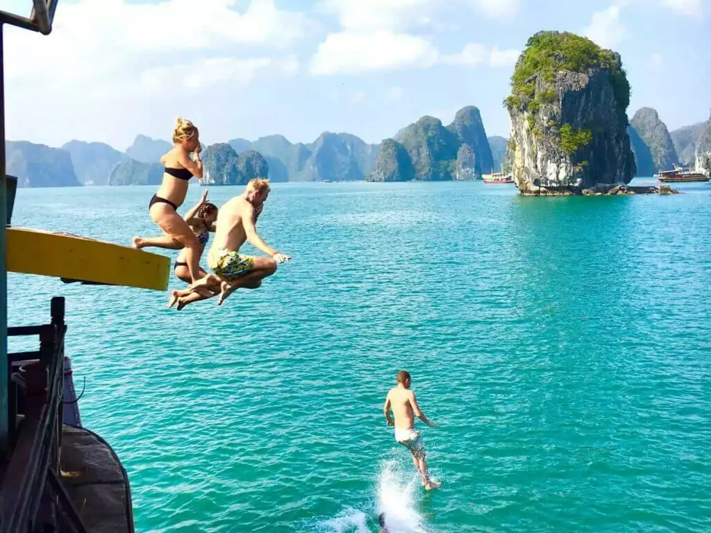 Swimming directly from a cruise ship in Ao Ech Area's crystal-clear enclosed lagoon -- Lan Ha Bay's most unique open-water swimming experience