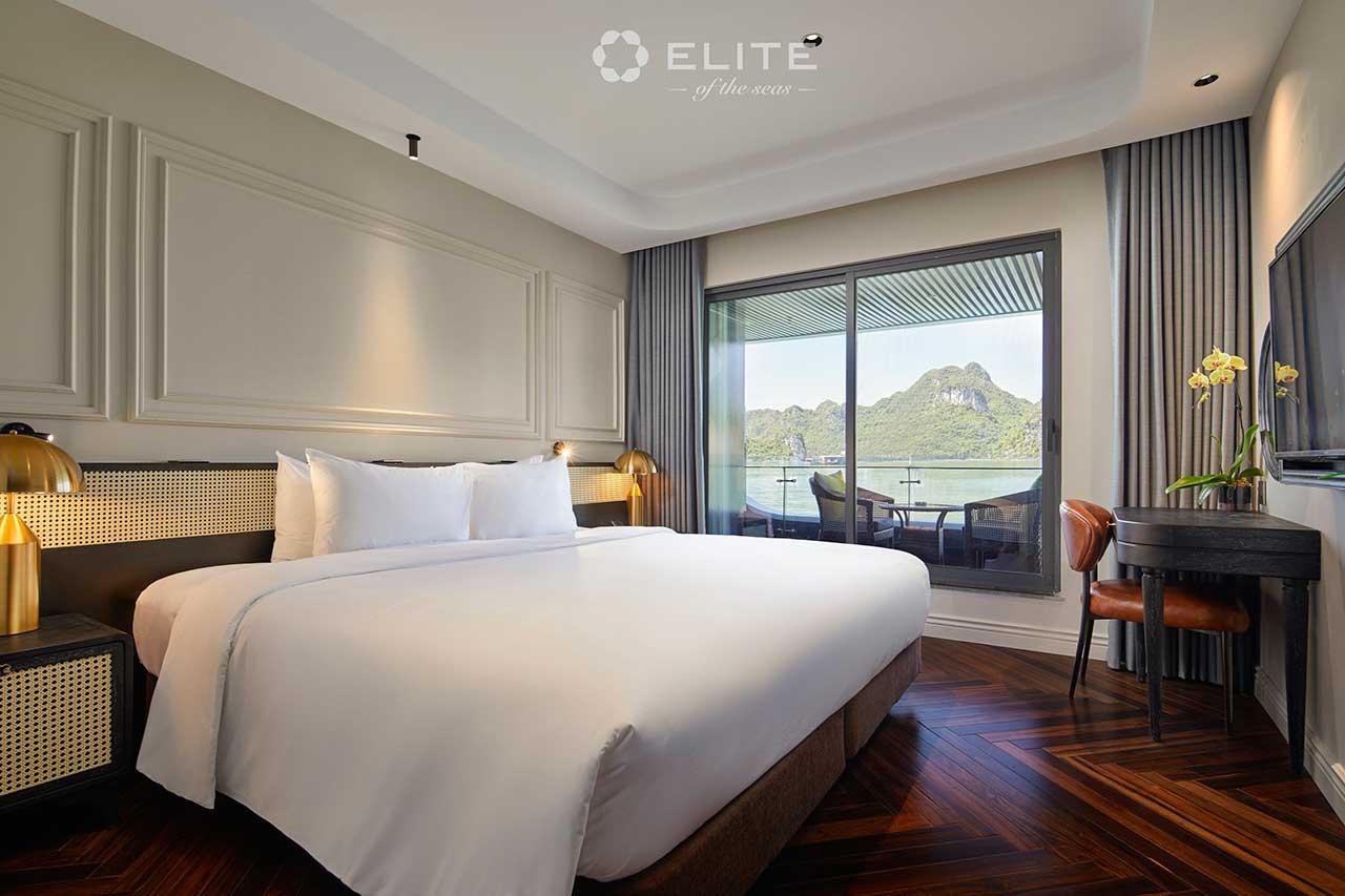Elite Junior Suite bedroom on Elite of the Seas Cruise with private balcony