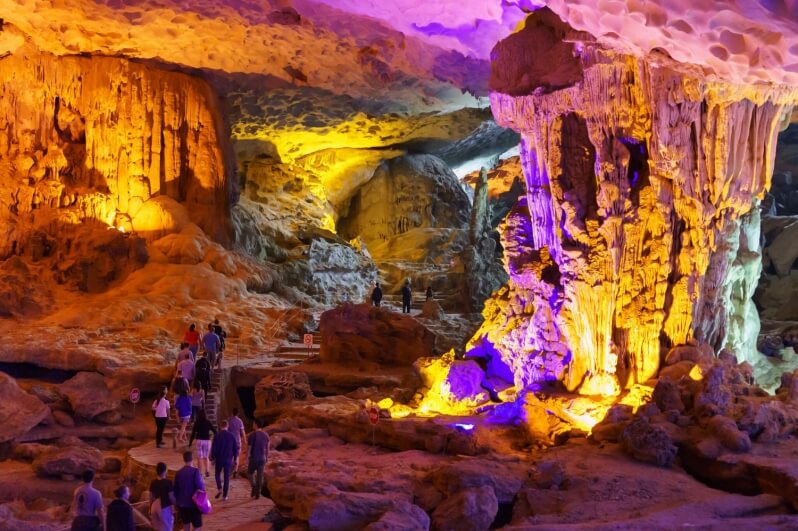 Colorful stalactites and stalagmites inside Sung Sot Cave visited by La Casta Daily Cruise