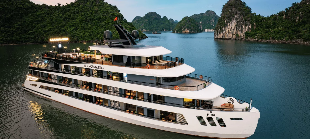 La Casta Star Cruise sailing through Lan Ha Bay at dusk