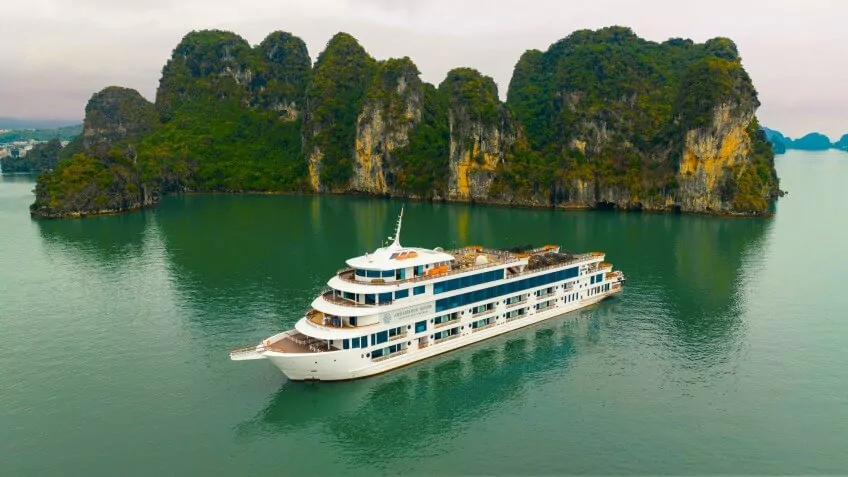 Ambassador Day Cruise sailing past Halong Bay limestone karsts
