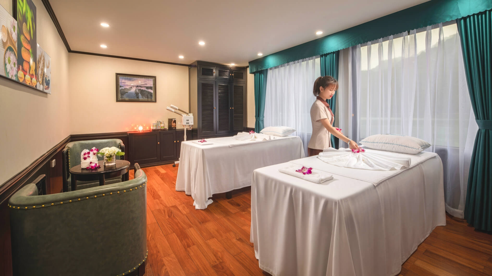Aspira Cruise spa and massage room with twin treatment beds