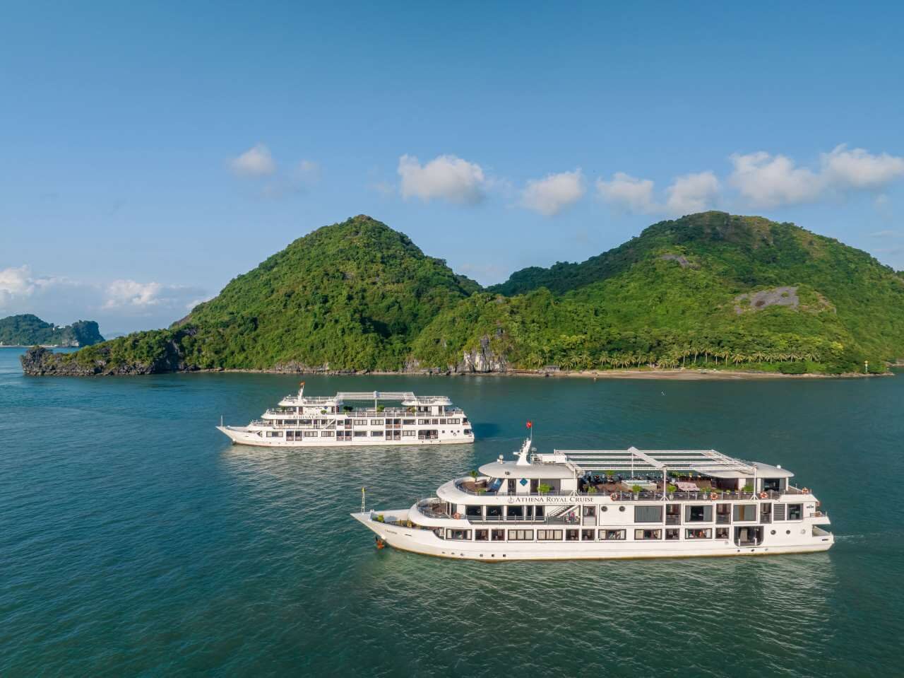 Athena Royal Cruise fleet sailing together in Bai Tu Long Bay