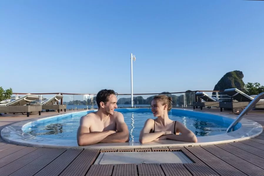 Poolside loungers at La Piscine on Heritage Binh Chuan Cruise.