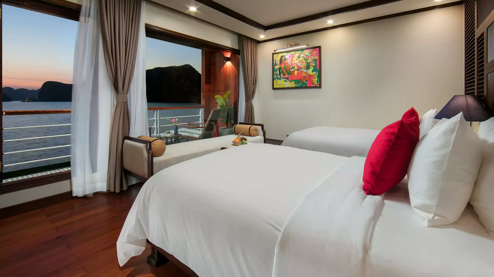 Ocean Suite on Heritage Binh Chuan Cruise, one of 10 suites on the 2nd deck with sunset bay views.