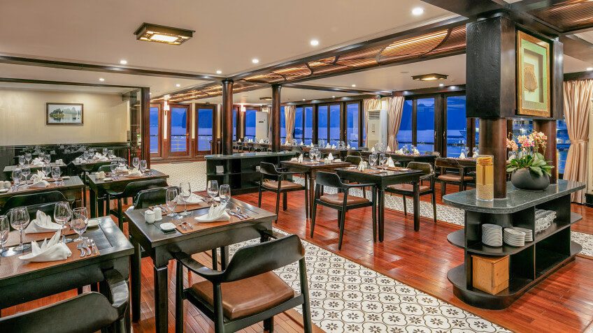 Elegant onboard restaurant with bay views on Milalux Cruise