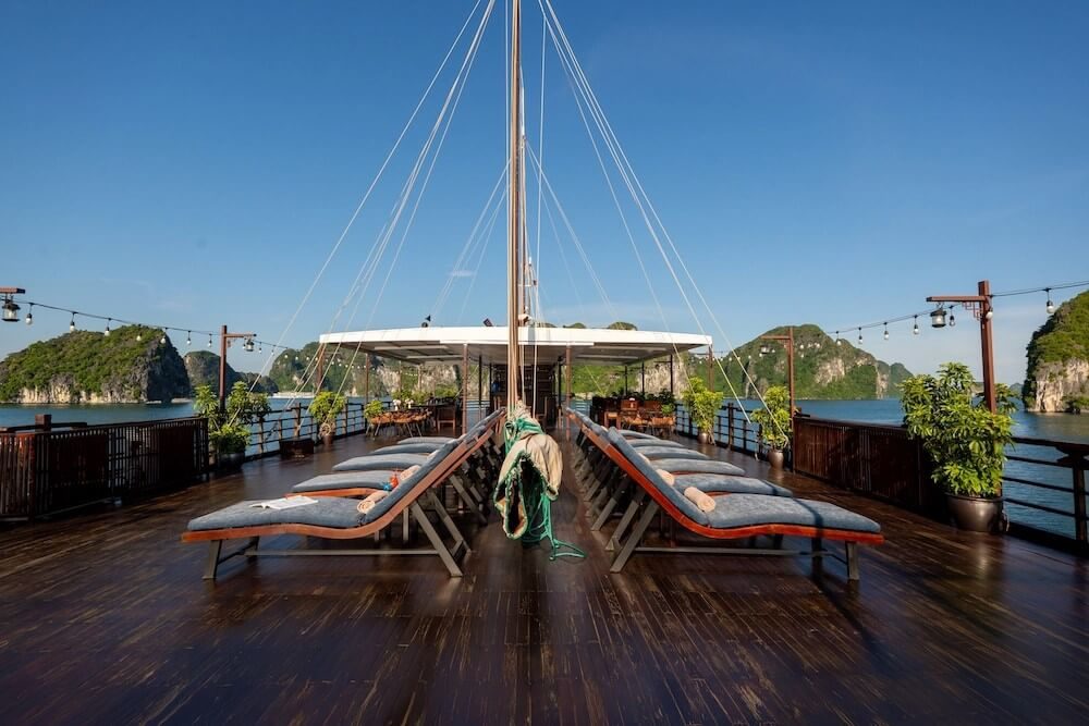 Panoramic sundeck with lounge beds on Milalux Cruise Halong Bay