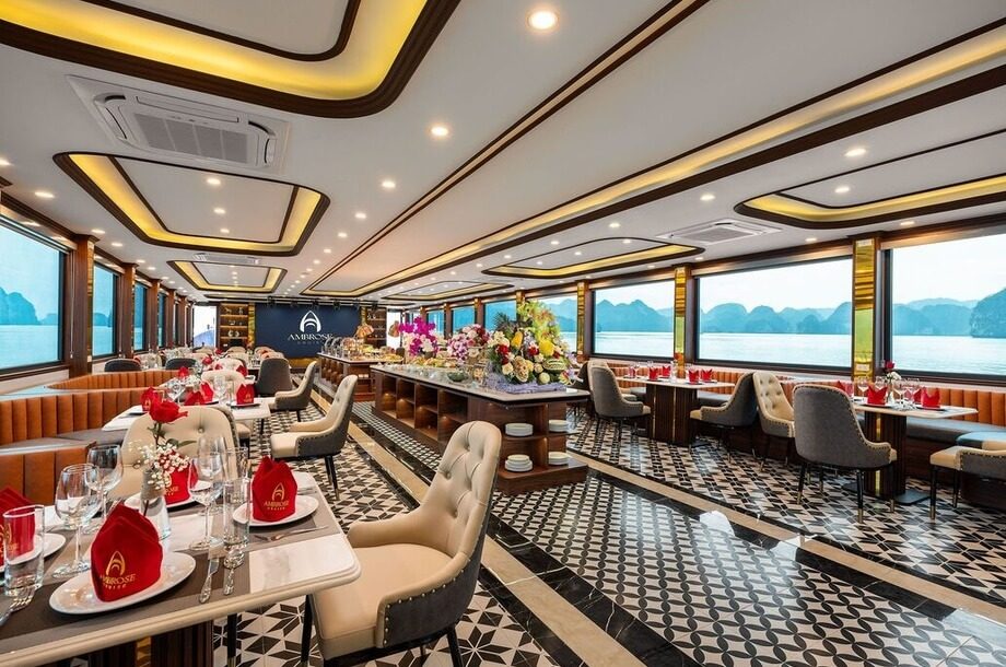 Dining table set for lunch service aboard Ambrose Day Cruise Halong Bay
