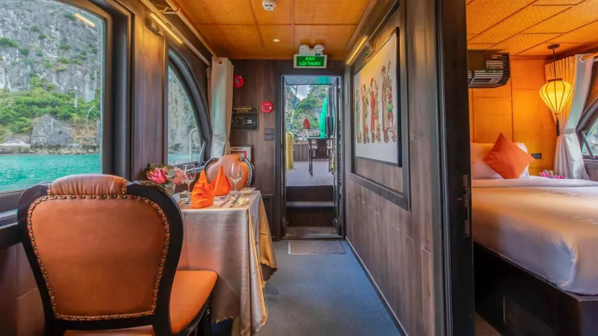 Wood-panelled cabin corridor on L’amour Private Junk