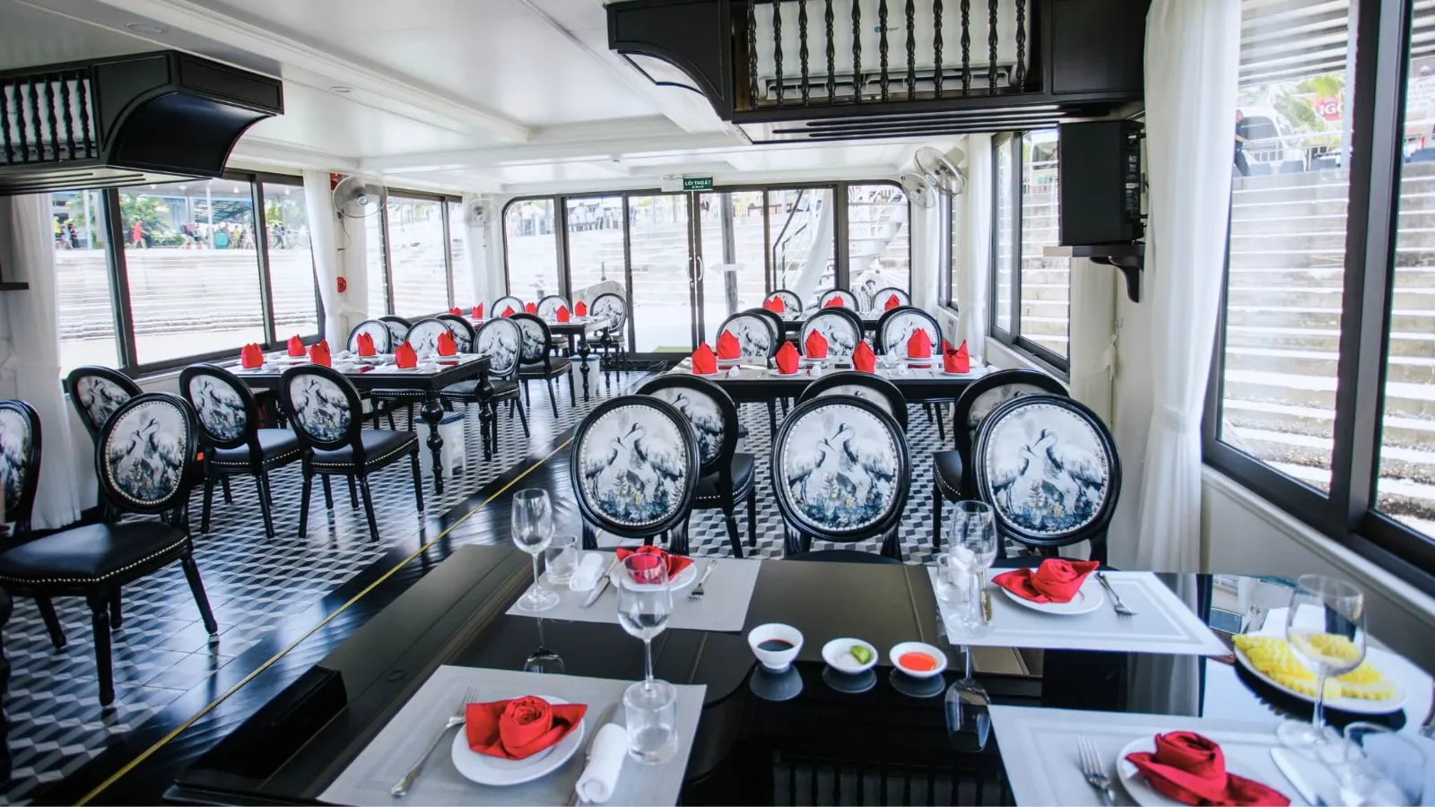 Halong Phoenix Day Cruise – Restaurant at Harbor Elegant restaurant interior of Halong Phoenix Day Cruise docked at the harbor