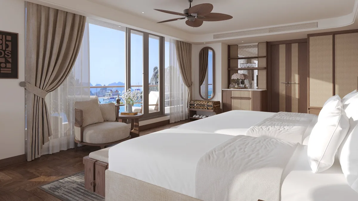 Harmony Exclusive Suite bed facing the bay – Harmony Boutique Cruise
