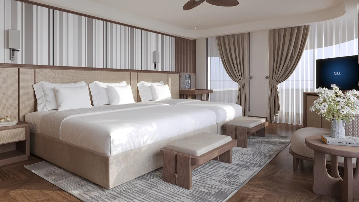 Harmony Exclusive Suite bed and TV – Harmony Boutique Cruise