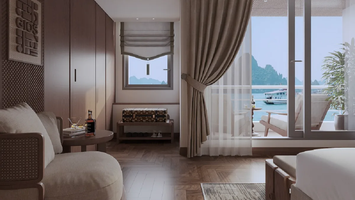 Ocean View Suite sitting area by the window – Harmony Boutique Cruise