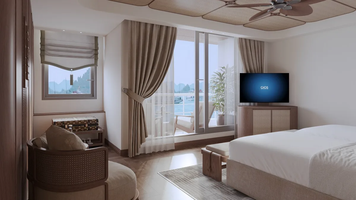 Ocean View Suite bed, TV and bay view – Harmony Boutique Cruise