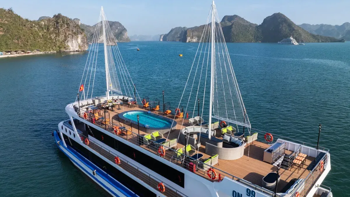 La Casta Daily Cruise sundeck pool area surrounded by Halong Bay limestone karsts