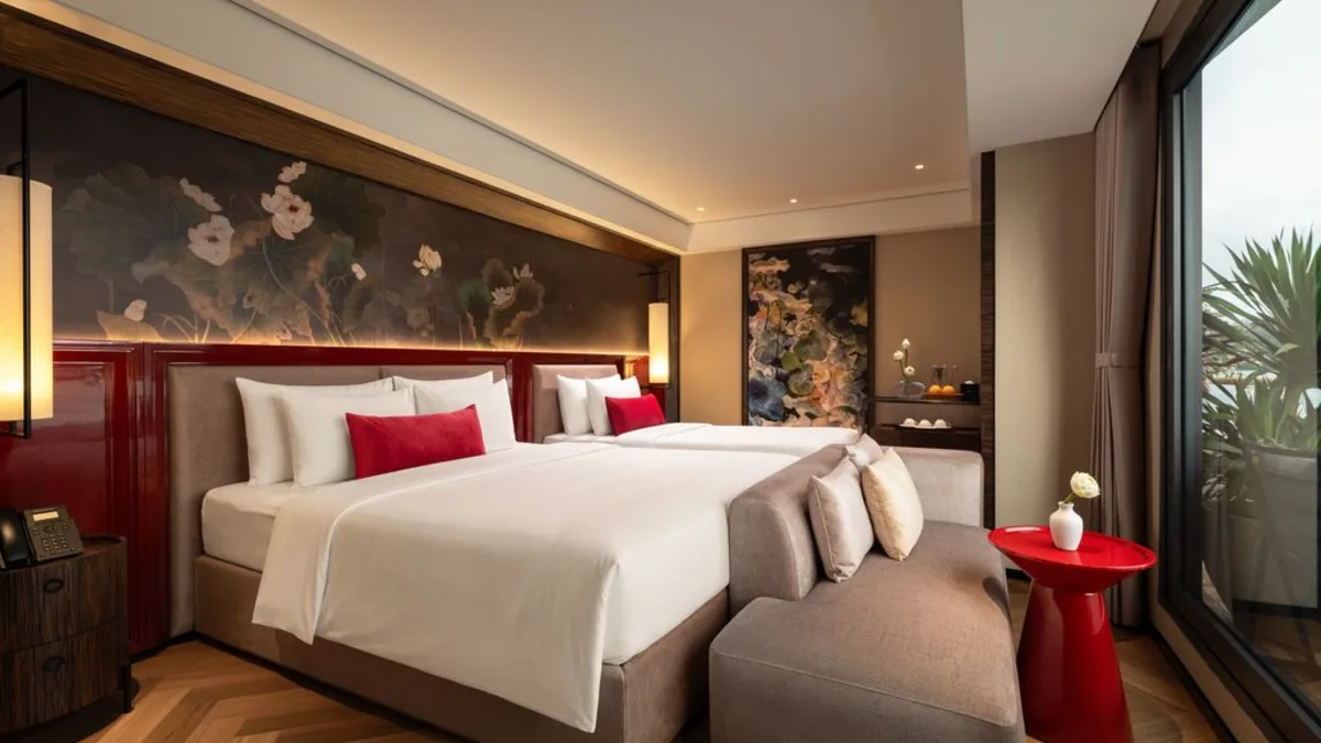 Bedroom of the Ocean View Premier Family Suite on La SEN of the Bay Cruises