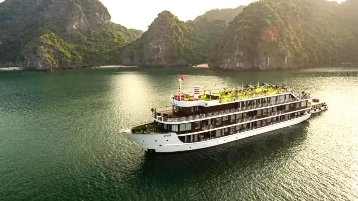 La Casta Regal deluxe cruise ship near karst islands in Lan Ha Bay