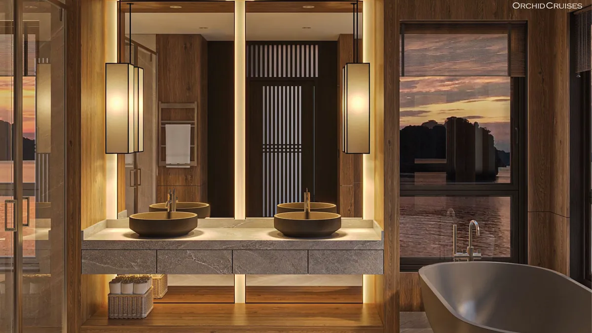 Double vanity and bathtub with bay view in the Orchid Exclusive Suite