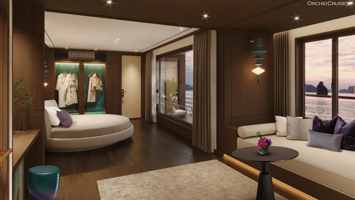 Orchid Exclusive Suite with round king bed and sofa on Orchid Luxury Cruise Orchid Exclusive Suite with round king bed and sofa on Orchid Luxury Cruise