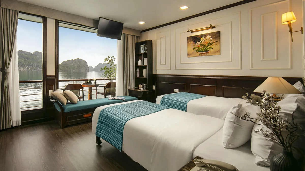 Deluxe Balcony cabin with twin beds on Orchid Trendy Cruise