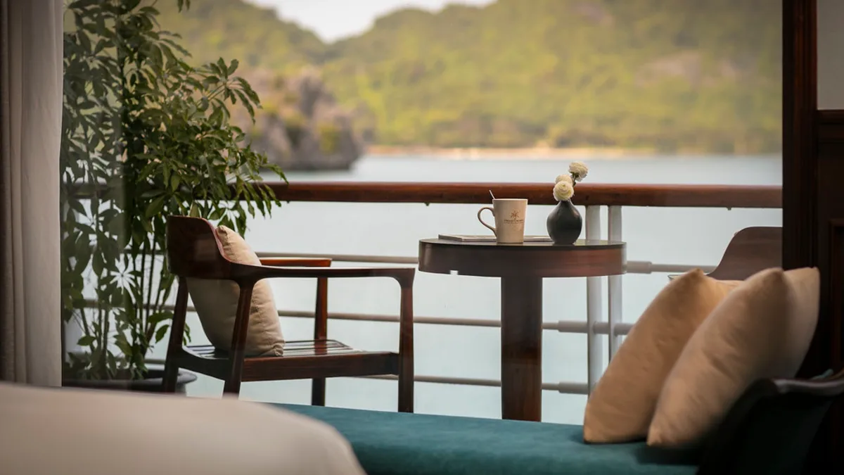 Balcony seating of a Deluxe cabin on Orchid Trendy Cruise