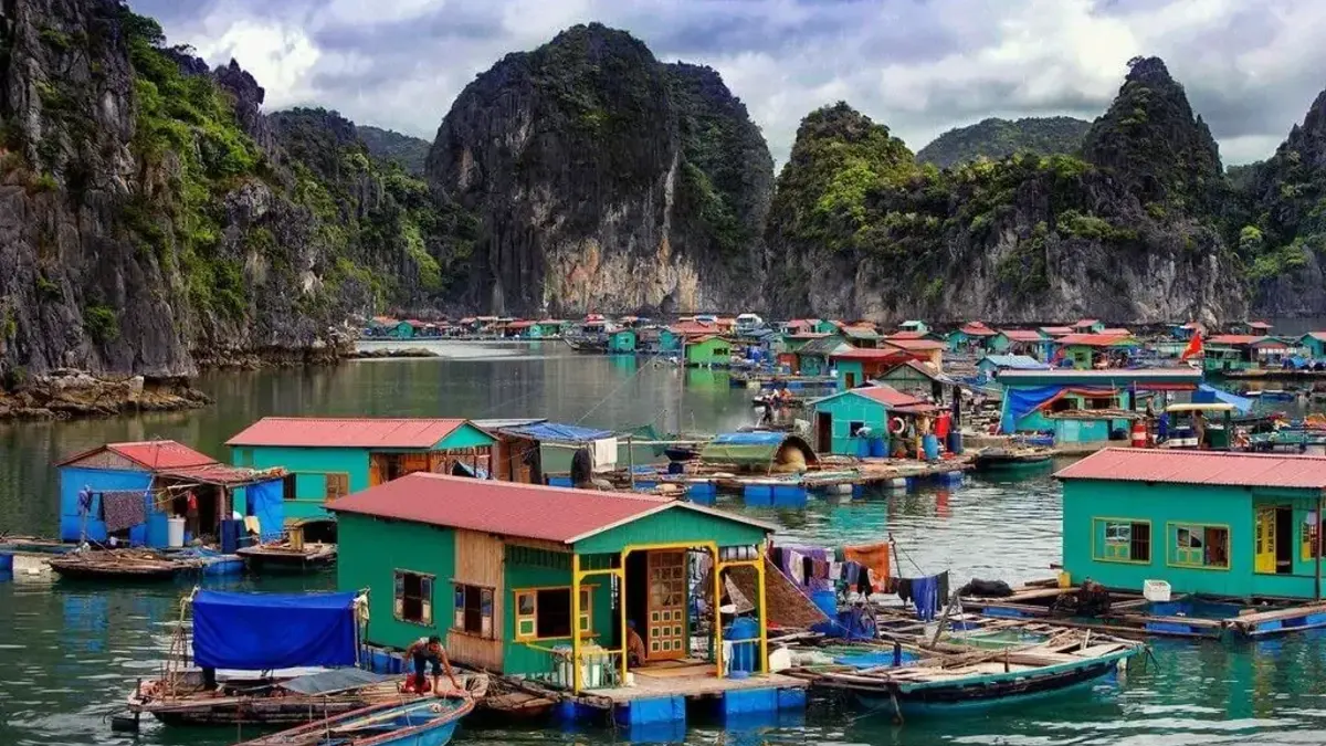 Vung Vieng Fishing Village — traditional floating wooden homes, one of the last floating communities in Vietnam, Bai Tu Long Bay